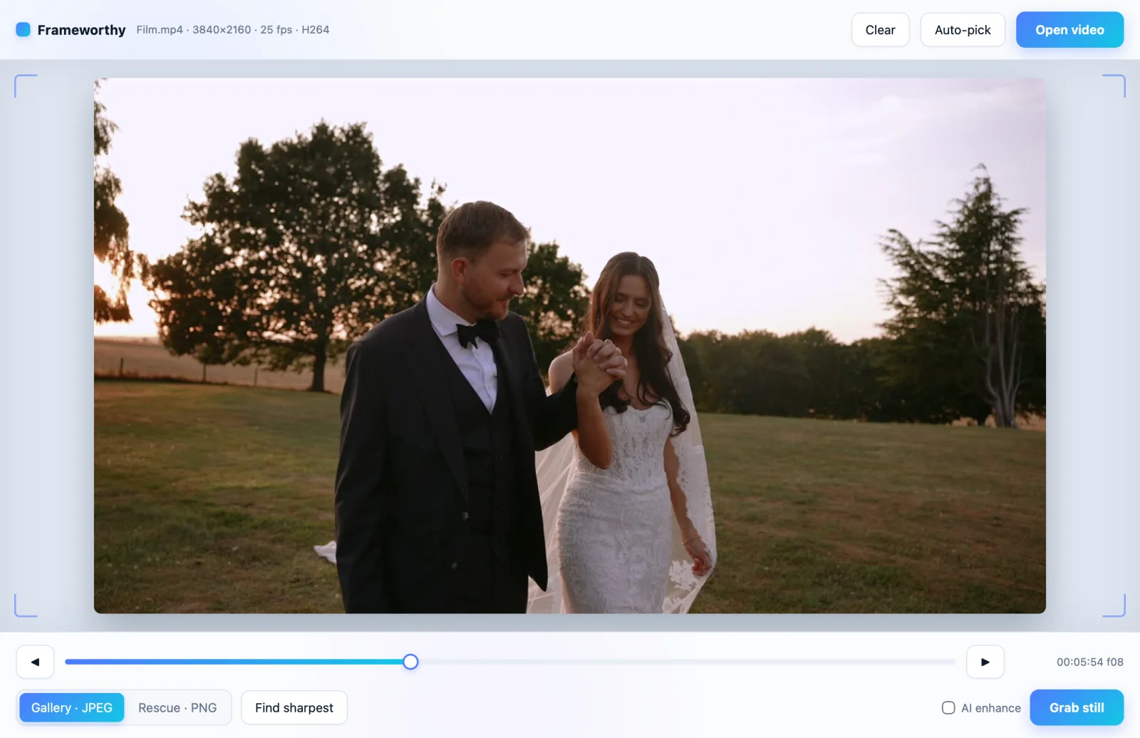 Frameworthy paused on a golden hour frame of a couple walking hand in hand, a frame accurate scrubber underneath