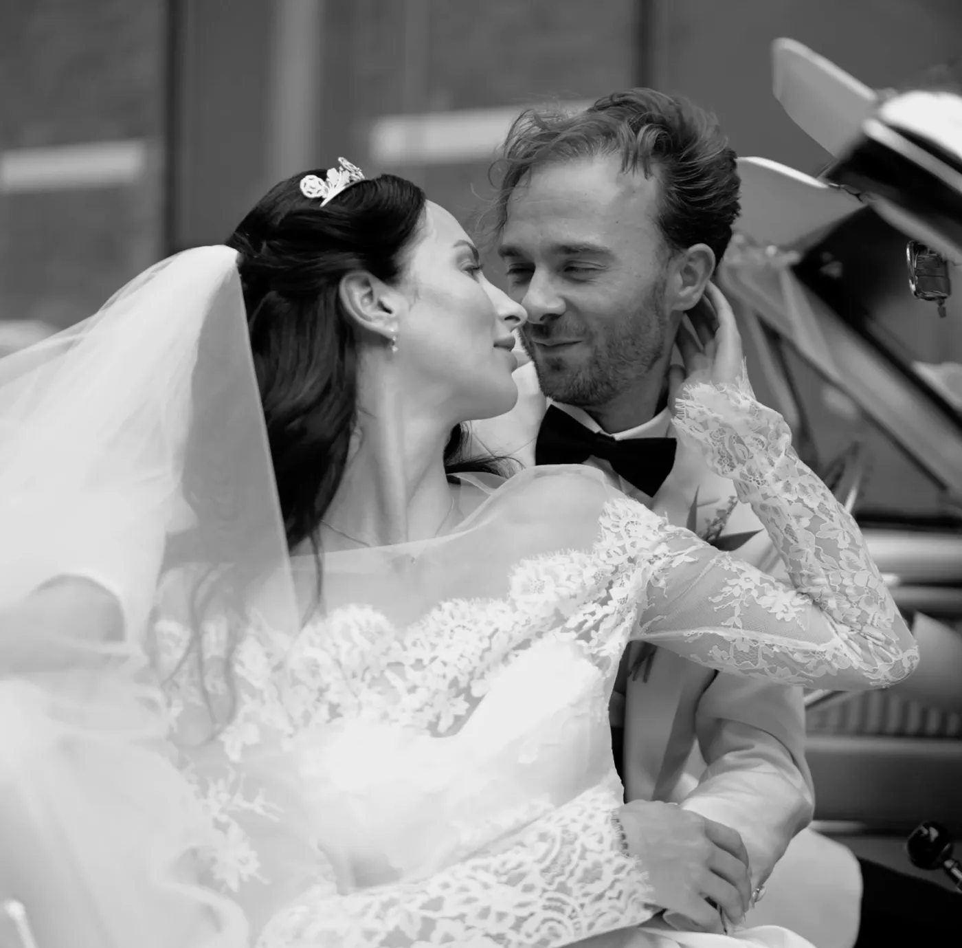 Bride and groom in a candlelit dining room